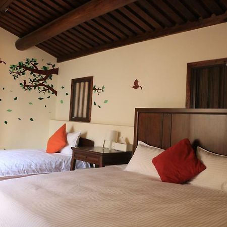 Longmen Inn Bed And Breakfast Jinning Buitenkant foto