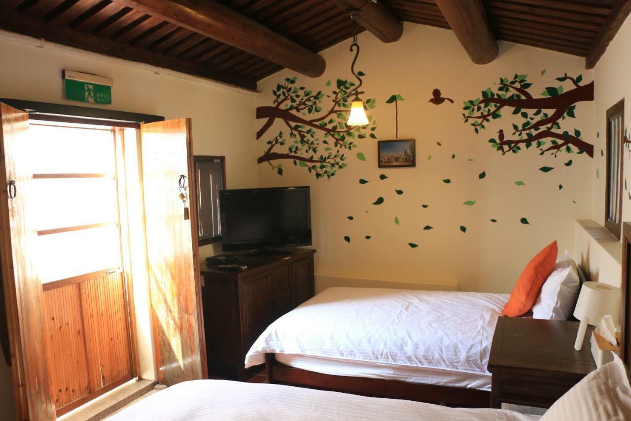 Longmen Inn Bed And Breakfast Jinning Buitenkant foto